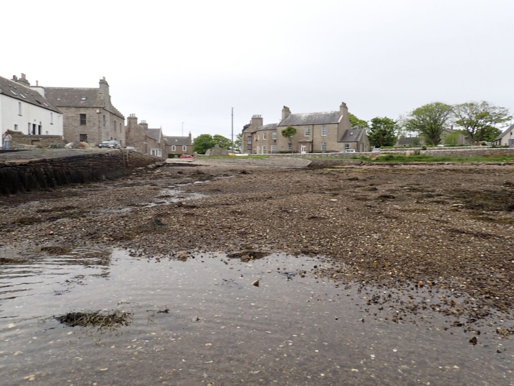 Photograph of St Margaret's Hope Public Slipway from the water's edge of Low Water Neaps